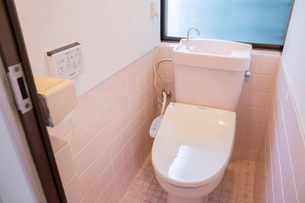 Apartment 梅田usj近く 弁天町駅まで徒歩8分650ｍ無料駐車場有り! ポケットwifi貸出可 一軒家貸切